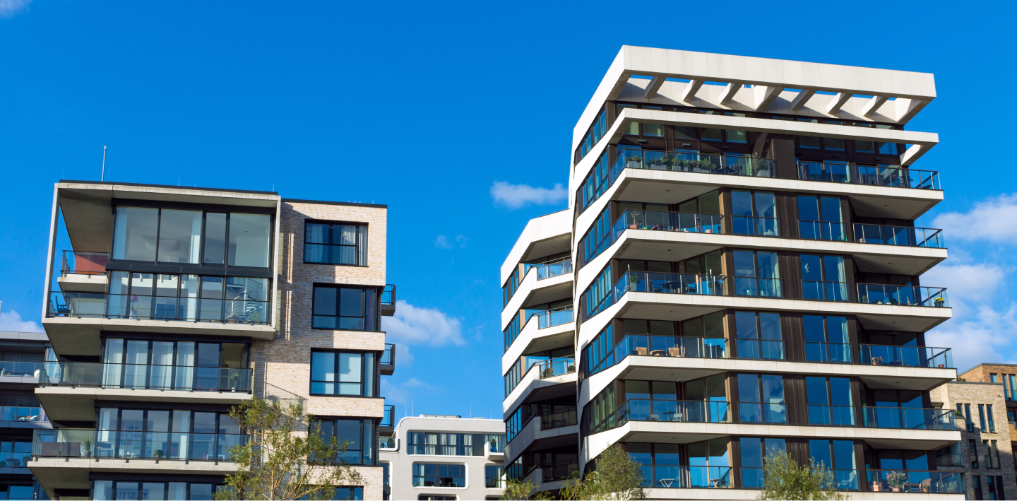 Modern residential buildings under a blue sky